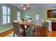 Dining area with hardwood floors and decorative accents at 1751 Bee Balm Rd Rd, Johns Island, SC 29455