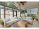 Bright sunroom with wicker furniture and light flooring at 1751 Bee Balm Rd Rd, Johns Island, SC 29455