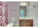 Bathroom with purple walls, single vanity and shower/tub combo at 1751 Bee Balm Rd Rd, Johns Island, SC 29455