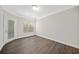 Bright bedroom featuring hardwood floors and access to a private balcony at 1012 Basildon Rd, Mount Pleasant, SC 29466