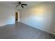 Spacious bedroom with hardwood floors and neutral walls at 6805 Sc-162, Hollywood, SC 29449