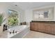 Bathroom featuring a bathtub, double vanity, and large mirror at 1109 Pinefield Dr, Wando, SC 29492