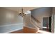 Formal dining area with hardwood floors and chandelier at 1450 Coopers Hawk Dr, Hanahan, SC 29410
