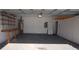 Garage with overhead storage and workbench at 1450 Coopers Hawk Dr, Hanahan, SC 29410
