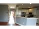 Modern kitchen featuring stainless steel appliances and white cabinetry at 1450 Coopers Hawk Dr, Hanahan, SC 29410
