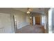 Bright bedroom featuring a ceiling fan and ample closet space at 1450 Coopers Hawk Dr, Hanahan, SC 29410