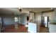 Open concept kitchen and living area with hardwood floors at 1450 Coopers Hawk Dr, Hanahan, SC 29410