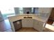 Kitchen island with sink and stainless steel dishwasher at 1450 Coopers Hawk Dr, Hanahan, SC 29410