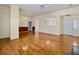 Bright living room with hardwood floors and access to kitchen at 1505 Sweet Myrtle Cir, Mount Pleasant, SC 29466