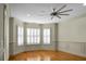 Living room with hardwood floors and bay window at 4252 Faber Dr # 203, North Charleston, SC 29405