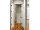 Hallway with hardwood floors and doors at 4252 Faber Place Dr # 203, North Charleston, SC 29405