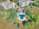 Community pool and surrounding lush landscaping at 4252 Faber Place Dr # 203, North Charleston, SC 29405