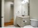 Simple bathroom with vanity, toilet and access to another room at 4252 Faber Place Dr # 203, North Charleston, SC 29405