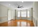 Large living room with hardwood floors and bay window at 4252 Faber Place Dr # 203, North Charleston, SC 29405