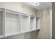 Walk-in closet with custom shelving at 4252 Faber Place Dr # 203, North Charleston, SC 29405