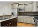 Modern kitchen with stainless steel appliances and granite countertops at 4252 Faber Place Dr # 203, North Charleston, SC 29405