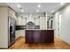 Modern kitchen with stainless steel appliances and hardwood floors at 4252 Faber Place Dr # 203, North Charleston, SC 29405