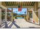 Community pool and patio area with tables and chairs at 4252 Faber Place Dr # 203, North Charleston, SC 29405