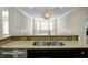 Island kitchen sink with granite countertops at 4252 Faber Place Dr # 203, North Charleston, SC 29405
