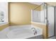 Bathroom with soaking tub and separate shower at 115 Longford Dr, Summerville, SC 29483