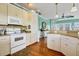 Open concept kitchen with island and hardwood floors at 202 Mary St, Edisto Island, SC 29438