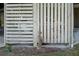 Covered patio area with wooden privacy screen at 202 Mary St, Edisto Island, SC 29438