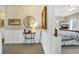 Hallway with white wainscoting and access to bedrooms at 202 Mary St, Edisto Island, SC 29438