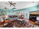 Spacious living room with large screen TV and comfortable seating at 202 Mary St, Edisto Island, SC 29438