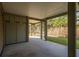 Covered patio with concrete flooring and storage at 202 Mary St, Edisto Island, SC 29438
