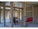 Relaxing covered patio with swings and ceiling fan at 202 Mary St, Edisto Island, SC 29438