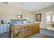 Main bedroom with king-size bed and en-suite bathroom access at 202 Mary St, Edisto Island, SC 29438