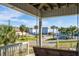 Relaxing porch swing overlooking the beach and neighborhood at 202 Mary St, Edisto Island, SC 29438