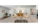 Kitchen island with granite countertop and double sink, overlooking living room at 2215 Macallan Blvd, Ravenel, SC 29470