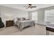 Bright bedroom with carpeted floor, comfortable bed, and ample natural light at 236 Godwit Dr, Summerville, SC 29486