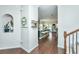 Open concept entryway offering a view of kitchen and staircase at 432 Verbena Ave, Summerville, SC 29483