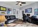 Home office with a black leather couch and work space at 211 Ilderton St, Summerville, SC 29483