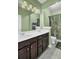 Double vanity bathroom with dark brown cabinets at 211 Ilderton St, Summerville, SC 29483