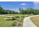 Enjoy outdoor dining with several picnic tables in a wooded setting at 211 Ilderton St, Summerville, SC 29483