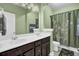Bathroom with double vanity and a green color scheme at 211 Ilderton St, Summerville, SC 29483