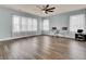 Spacious bonus room featuring hardwood floors and ceiling fan at 211 Ilderton St, Summerville, SC 29483