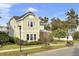 Two-story craftsman style home with a light green exterior and landscaping at 211 Ilderton St, Summerville, SC 29483