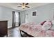 Charming bedroom with floral bedding and ceiling fan at 211 Ilderton St, Summerville, SC 29483