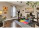 Home gym with elliptical, stationary bike, and work space at 211 Ilderton St, Summerville, SC 29483