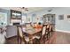 Spacious dining area with hardwood floors and a view into the living room at 211 Ilderton St, Summerville, SC 29483