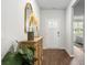 Bright and airy entryway with wood-look floors, and decorative accents at 2215 Macallan Blvd, Ravenel, SC 29470