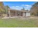 Brick house with covered porch and detached garage at 313 Fairlawn Dr, Moncks Corner, SC 29461