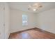 Well-lit bedroom featuring wood flooring and a window at 313 Fairlawn Dr, Moncks Corner, SC 29461