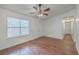 Living room with hardwood floors, ceiling fan, and white walls at 313 Fairlawn Dr, Moncks Corner, SC 29461