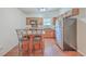 Modern kitchen with stainless steel appliances and wood cabinets at 313 Fairlawn Dr, Moncks Corner, SC 29461