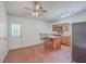 Eat-in kitchen with wood cabinets, granite countertops, and breakfast bar at 313 Fairlawn Dr, Moncks Corner, SC 29461
